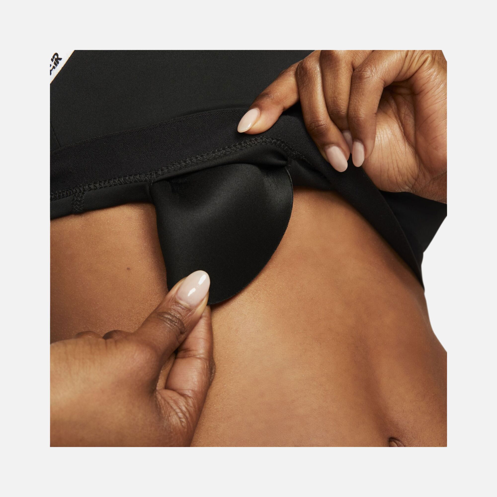 Nike Air Dri-Fit Indy Light-Support Padded Logo Tape Sports Kadın Bra